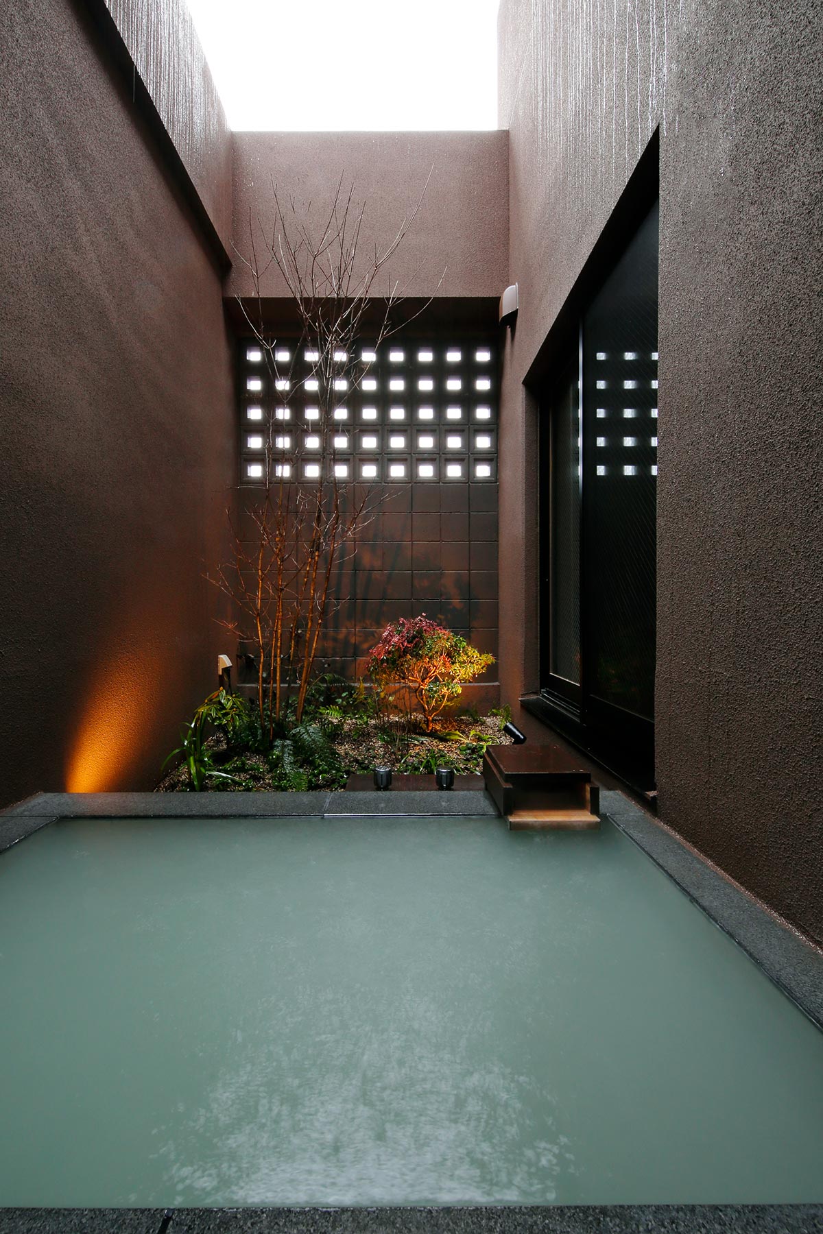 With miniature garden open-air bath